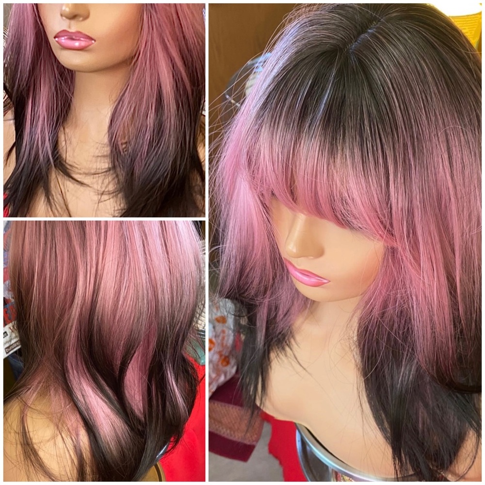 Bubblegum pink and black wig layered with bangs